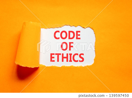 Code of ethics words symbol. Concept words Code of ethics on beautiful white paper. Beautiful orange background. Business Code of ethics concept. Copy space. 139597450