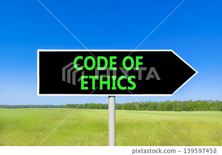 Code of ethics words symbol. Concept words Code of ethics on beautiful black road sign. Beautiful blue sky green field background. Business Code of ethics concept. Copy space. Code of ethics words symbol. Concept words Code of ethics on beautiful black road sign. Beautiful blue sky green field background. Business Code of ethics concept. Copy space. 139597458