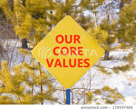 Our core values words symbol. Concept words Our core values on beautiful yellow road sign. Beautiful winter forest background. Business our core values motivational support concept. Copy space. Our core values words symbol. Concept words Our core values on beautiful yellow road sign. Beautiful winter forest background. Business our core values motivational support concept. Copy space. 139597466