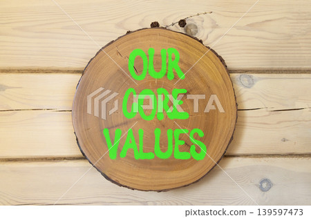 Our core values words symbol. Concept words Our core values on beautiful wooden circle. Beautiful wooden wall background. Business our core values motivational support concept. Copy space. Our core values words symbol. Concept words Our core values on beautiful wooden circle. Beautiful wooden wall background. Business our core values motivational support concept. Copy space. 139597473