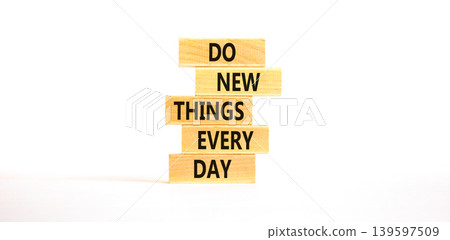 Do new things every day words symbol. Concept words Do new things every day on beautiful wooden blocks. Beautiful white paper background. Business do new things every day concept. Copy space. Do new things every day words symbol. Concept words Do new things every day on beautiful wooden blocks. Beautiful white paper background. Business do new things every day concept. Copy space. 139597509