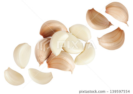 garlic cloves isolated on white background close up. Top view. Flat lay. garlic cloves isolated on white background close up. Top view. Flat lay. 139597554