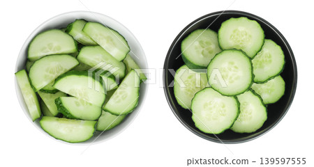 Sliced cucumber in ceramic bowl isolated on white background with full depth of field. Top view. Flat lay. Sliced cucumber in ceramic bowl isolated on white background with full depth of field. Top view. Flat lay. 139597555
