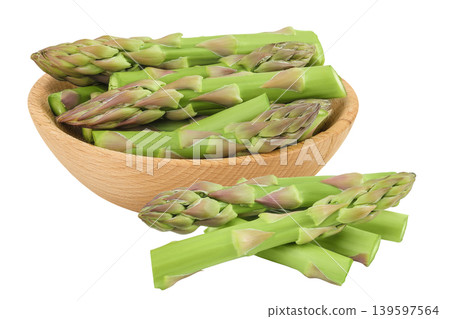 fresh asparagus in wooden bowl isolated on white background fresh asparagus in wooden bowl isolated on white background 139597564