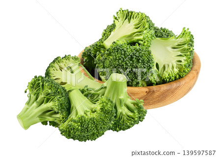 fresh broccoli in wooden bowl isolated on white background close-up with full depth of field. fresh broccoli in wooden bowl isolated on white background close-up with full depth of field. 139597587