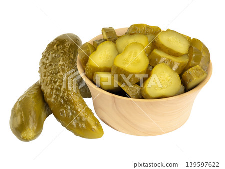 Marinated pickled cucumber in wooden bowl isolated on white background with full depth of field Marinated pickled cucumber in wooden bowl isolated on white background with full depth of field 139597622