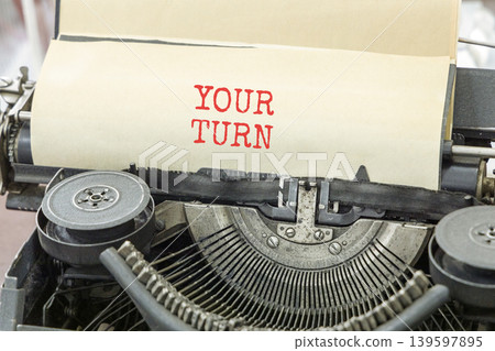 Your turn words symbol. Concept words Your turn typed on beautiful old retro typewriter. Beautiful white background. Business your turn motivational support concept. Copy space. Your turn words symbol. Concept words Your turn typed on beautiful old retro typewriter. Beautiful white background. Business your turn motivational support concept. Copy space. 139597895