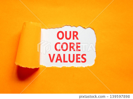 Our core values words symbol. Concept words Our core values on beautiful white paper. Beautiful orange background. Business our core values motivational support concept. Copy space. Our core values words symbol. Concept words Our core values on beautiful white paper. Beautiful orange background. Business our core values motivational support concept. Copy space. 139597898