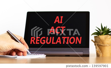 AI act regulation words symbol. Concept words AI artificial intelligence act regulation on beautiful black tablet. Beautiful white background. Business AI act regulation concept. Copy space. 139597901