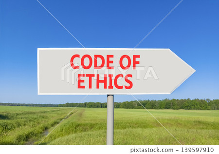 Code of ethics words symbol. Concept words Code of ethics on beautiful grey road sign. Beautiful blue sky green field background. Business Code of ethics concept. Copy space. 139597910