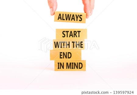 Start with the end in mind symbol. Concept words Always start with the end in mind on beautiful wooden blocks. Beautiful white background. Business start with the end in mind concept. Copy space. 139597924