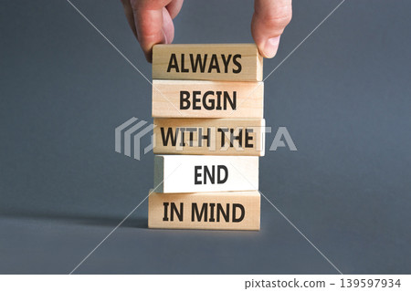 Begin with the end in mind symbol. Concept words Always begin with the end in mind on beautiful wooden blocks. Beautiful grey paper background. Business begin with the end in mind concept. Copy space. Begin with the end in mind symbol. Concept words Always begin with the end in mind on beautiful wooden blocks. Beautiful grey paper background. Business begin with the end in mind concept. Copy space. 139597934