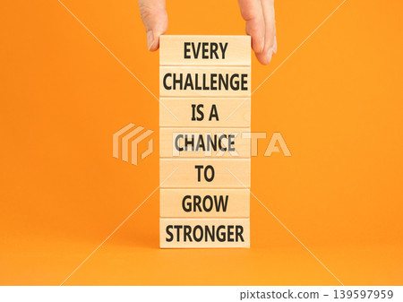 Challenge word symbol. Concept words Every challenge is a chance to grow stronger on beautiful wooden blocks. Beautiful orange paper background. Business challenge is opportunity concept. Copy space. Challenge word symbol. Concept words Every challenge is a chance to grow stronger on beautiful wooden blocks. Beautiful orange paper background. Business challenge is opportunity concept. Copy space. 139597959