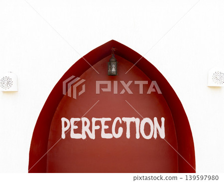Perfection symbol. Concept word Perfection on beautiful red wall. Beautiful red and white wall background. Business perfection concept. Copy space. Perfection symbol. Concept word Perfection on beautiful red wall. Beautiful red and white wall background. Business perfection concept. Copy space. 139597980