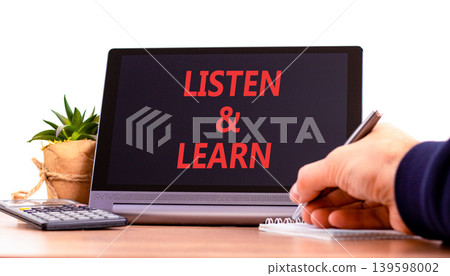 Listen and learn words symbol. Concept words Listen and learn on beautiful black tablet. Beautiful white background. Businessman hand. Business listen and learn support concept. Copy space. Listen and learn words symbol. Concept words Listen and learn on beautiful black tablet. Beautiful white background. Businessman hand. Business listen and learn support concept. Copy space. 139598002