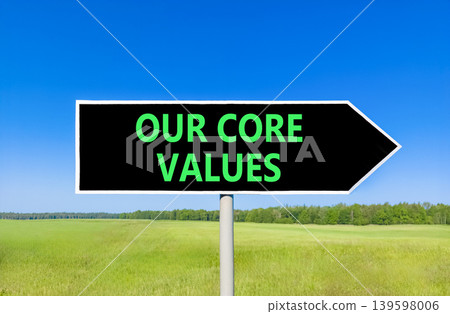 Our core values words symbol. Concept words Our core values on beautiful black road sign. Beautiful blue sky green field background. Business our core values motivational support concept. Copy space. Our core values words symbol. Concept words Our core values on beautiful black road sign. Beautiful blue sky green field background. Business our core values motivational support concept. Copy space. 139598006