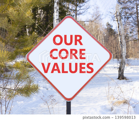 Our core values words symbol. Concept words Our core values on beautiful white road sign. Beautiful winter forest background. Business our core values motivational support concept. Copy space. Our core values words symbol. Concept words Our core values on beautiful white road sign. Beautiful winter forest background. Business our core values motivational support concept. Copy space. 139598013