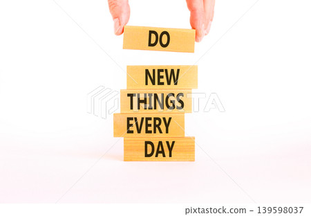 Do new things every day words symbol. Concept words Do new things every day on beautiful wooden blocks. Beautiful white paper background. Business do new things every day concept. Copy space. Do new things every day words symbol. Concept words Do new things every day on beautiful wooden blocks. Beautiful white paper background. Business do new things every day concept. Copy space. 139598037