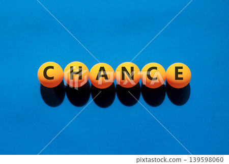Chance symbol. Concept word Chance on beautiful orange table tennis ping pong balls. Beautiful blue background. Business chance concept. Copy space. Chance symbol. Concept word Chance on beautiful orange table tennis ping pong balls. Beautiful blue background. Business chance concept. Copy space. 139598060