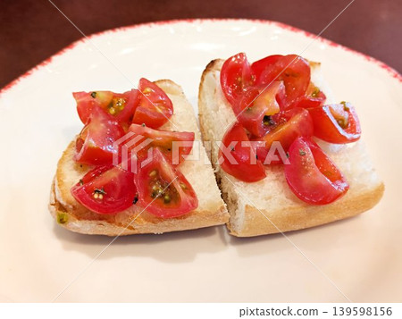 Italian bruschetta appetizer topped with plenty of fresh cherry tomatoes 139598156
