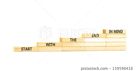 Start with the end in mind symbol. Concept words Start with the end in mind on beautiful wooden blocks. Beautiful white paper background. Business start with the end in mind concept. Copy space. Start with the end in mind symbol. Concept words Start with the end in mind on beautiful wooden blocks. Beautiful white paper background. Business start with the end in mind concept. Copy space. 139598418
