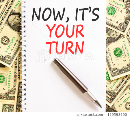 Now it's your turn words symbol. Concept words Now it's your turn on beautiful white note. Beautiful dollar bills background. Business Now it's your turn motivational support concept. Copy space. Now it's your turn words symbol. Concept words Now it's your turn on beautiful white note. Beautiful dollar bills background. Business Now it's your turn motivational support concept. Copy space. 139598500