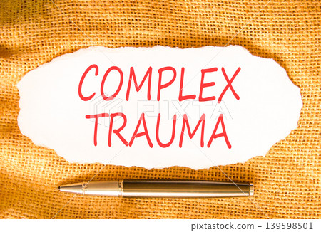 Complex trauma words symbol. Concept words Complex trauma on beautiful white paper. Beautiful canvas background. Psychological complex trauma support concept. Copy space. Complex trauma words symbol. Concept words Complex trauma on beautiful white paper. Beautiful canvas background. Psychological complex trauma support concept. Copy space. 139598501