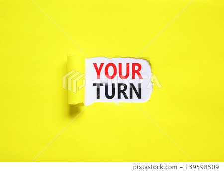 Your turn words symbol. Concept words Your turn on beautiful white paper. Beautiful yellow background. Business your turn motivational support concept. Copy space. Your turn words symbol. Concept words Your turn on beautiful white paper. Beautiful yellow background. Business your turn motivational support concept. Copy space. 139598509