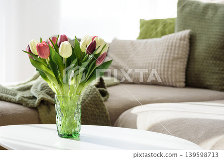 Living Room Decorated Spring Tulip Bouquet in Green Vase. Cozy Home Decor Arrangement Living Room Decorated Spring Tulip Bouquet in Green Vase. Cozy Home Decor Arrangement 139598713