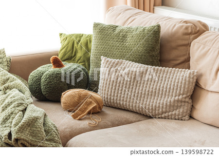 Knitting Setup with Yarn Basket and Cozy Sofa Knitting Setup with Yarn Basket and Cozy Sofa 139598722