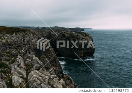 Rugged rocky atlantic coastline in Asturias with vast ocean Rugged rocky atlantic coastline in Asturias with vast ocean 139598773