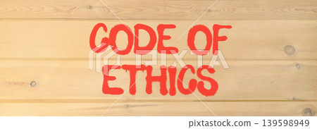 Code of ethics words symbol. Concept words Code of ethics on beautiful wooden wall. Beautiful wooden wall background. Business Code of ethics concept. Copy space. Code of ethics words symbol. Concept words Code of ethics on beautiful wooden wall. Beautiful wooden wall background. Business Code of ethics concept. Copy space. 139598949