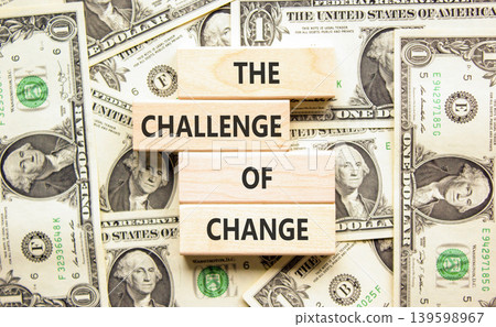 The challenge of change words symbol. Concept words The challenge of change on beautiful wooden blocks. Beautiful dollar bills background. Business the challenge of change concept. Copy space. The challenge of change words symbol. Concept words The challenge of change on beautiful wooden blocks. Beautiful dollar bills background. Business the challenge of change concept. Copy space. 139598967