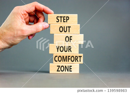 Leave comfort zone symbol. Concept words Step out of your comfort zone on beautiful wooden stick. Beautiful grey background. Business psychological step out your comfort zone concept. Copy space. Leave comfort zone symbol. Concept words Step out of your comfort zone on beautiful wooden stick. Beautiful grey background. Business psychological step out your comfort zone concept. Copy space. 139598983