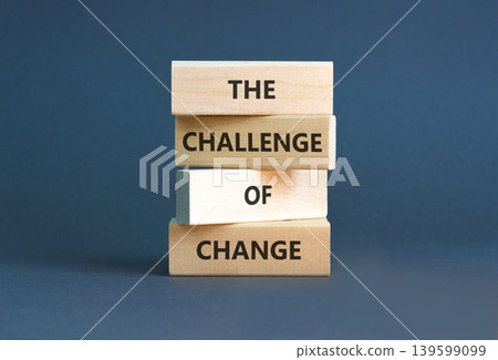 The challenge of change words symbol. Concept words The challenge of change on beautiful wooden blocks. Beautiful grey background. Business the challenge of change concept. Copy space. The challenge of change words symbol. Concept words The challenge of change on beautiful wooden blocks. Beautiful grey background. Business the challenge of change concept. Copy space. 139599099