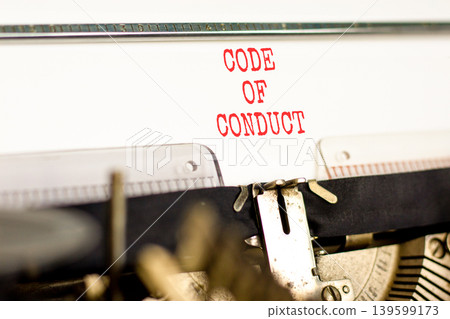 Code of conduct words symbol. Concept words Code of conduct typed on beautiful old retro typewriter. Beautiful white background. Business Code of conduct concept. Copy space. 139599173
