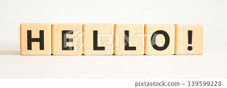Hello welcome support and help symbol. Concept word Hello on beautiful wooden blocks. Beautiful white background. Business psychological hello support and help concept. Copy space. Hello welcome support and help symbol. Concept word Hello on beautiful wooden blocks. Beautiful white background. Business psychological hello support and help concept. Copy space. 139599228