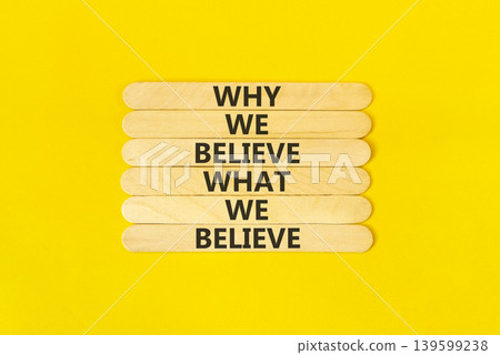 Why or what we believe words symbol. Concept words Why we believe what we believe on beautiful wooden sticks. Beautiful yellow background. Business why or what we believe concept. Copy space. 139599238