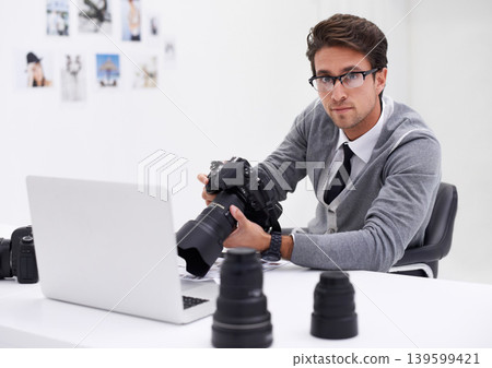 Man, photographer and portrait with laptop, camera and lens for work, shoot and editing photographs. Professional, office and technology with creativity, internet and equipment for videography Man, photographer and portrait with laptop, camera and lens for work, shoot and editing photographs. Professional, office and technology with creativity, internet and equipment for videography 139599421
