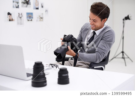 Man, camera and photography in office with happy smile, checking image batch and creative in workplace. Person, thinking and glasses for vision, technology and editor in agency for digital photoshoot 139599495