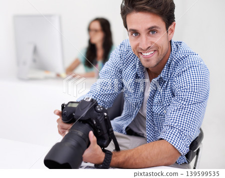 Man, photographer and portrait with camera, happy and lens for work, shoot and editing photographs. Professional, office and technology with creativity, internet and equipment for videography 139599535