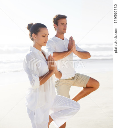 Beach yoga, balance and relax couple meditate for spiritual peace, self care and outdoor wellness for chakra healing. Freedom, pilates partner and yogi meditation for calm, zen mindset or mindfulness Beach yoga, balance and relax couple meditate for spiritual peace, self care and outdoor wellness for chakra healing. Freedom, pilates partner and yogi meditation for calm, zen mindset or mindfulness 139599580