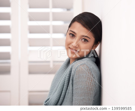 Woman, portrait and smile in a new home on the floor and carpet relax in the morning. Lounge, happy face and female person from India with living room, real estate and calm in a house by a wall Woman, portrait and smile in a new home on the floor and carpet relax in the morning. Lounge, happy face and female person from India with living room, real estate and calm in a house by a wall 139599585