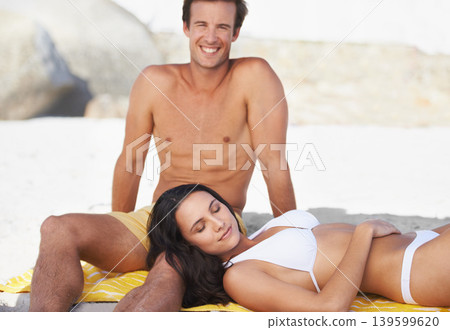 Portrait, relax and love with couple on beach together for holiday, vacation or romantic getaway. Smile, travel or summer with happy young man and woman by ocean or sea for coastal honeymoon Portrait, relax and love with couple on beach together for holiday, vacation or romantic getaway. Smile, travel or summer with happy young man and woman by ocean or sea for coastal honeymoon 139599620