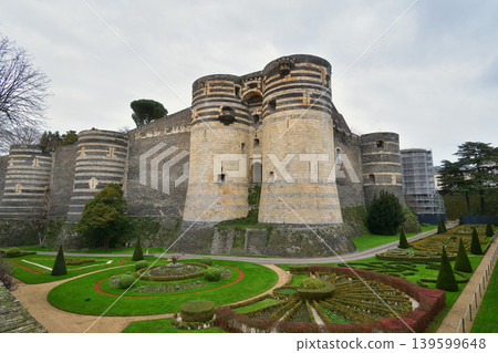 The walls of Angers Castle in France: A medieval fortress standing under a cloudy sky (December 26, 2023) The walls of Angers Castle in France: A medieval fortress standing under a cloudy sky (December 26, 2023) 139599648