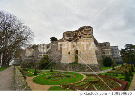 The walls of Angers Castle in France: A medieval fortress standing under a cloudy sky (December 26, 2023) 139599650