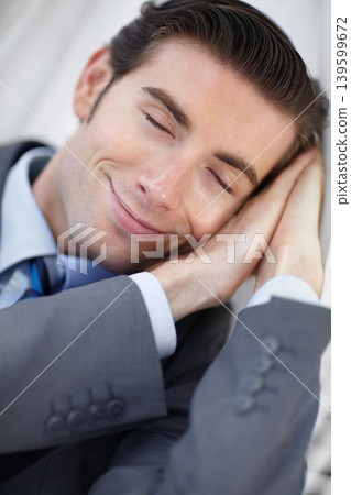 Sleeping, peace and tired business man in a hammock with low energy, resting or break outdoor. Sleepy, smile or face of male entrepreneur outside with fatigue, nap or travel burnout, lazy or dreaming 139599672