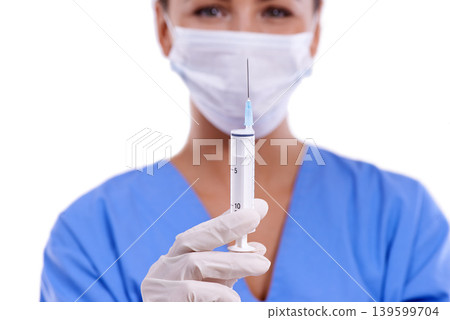 Woman, portrait and doctor with syringe for protection, health and safety on a white studio background. Female person, surgeon or medical nurse with needle and face mask for vaccination or anesthetic Woman, portrait and doctor with syringe for protection, health and safety on a white studio background. Female person, surgeon or medical nurse with needle and face mask for vaccination or anesthetic 139599704