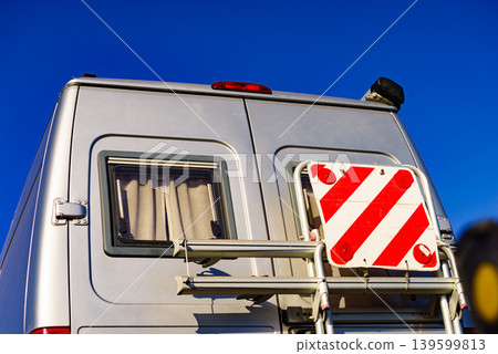 Car van with rack on back and rear warning sign for safety Car van with rack on back and rear warning sign for safety 139599813