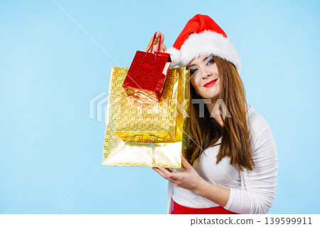 Happy Christmas woman with paper gift bags Happy Christmas woman with paper gift bags 139599911